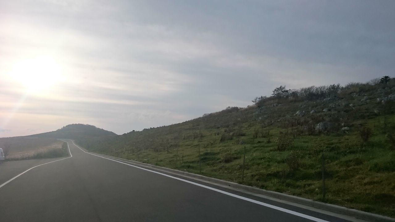 road, the way forward, tranquility, transportation, tree, sky, nature, day, scenics, beauty in nature, no people, outdoors, landscape, mountain