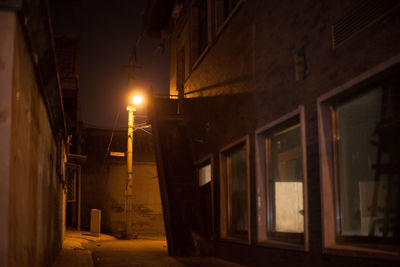 Illuminated street light at night