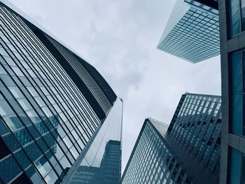 Low angle view of modern buildings against sky