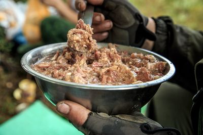 Close-up of person preparing food