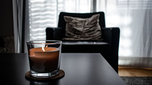 Close-up of drink on table at home