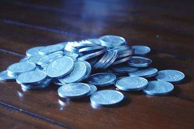 High angle view of coins on table