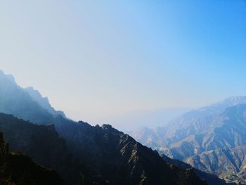 Scenic view of snowcapped mountains against clear sky