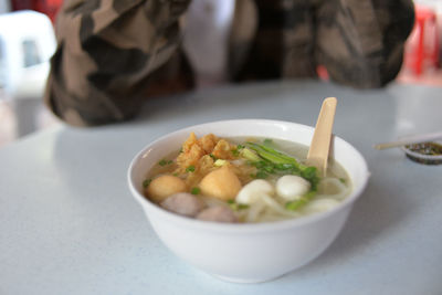 Close-up of soup in bowl on table