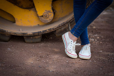 Low section of woman standing on floor