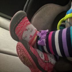 Close-up of woman wearing canvas shoes