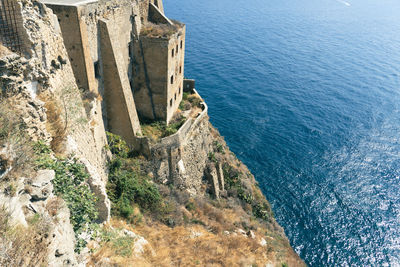 High angle view of cliff in sea