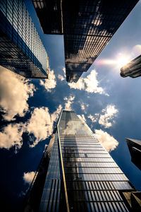 Low angle view of modern buildings against sky