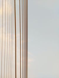 Low angle view of metal structure against sky