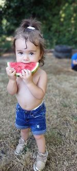 Portrait of cute girl with watermelon