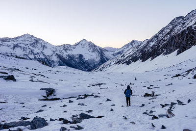 Full length of snowcapped mountains against sky during winter