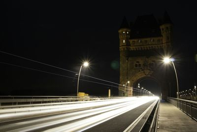 View of bridge at night