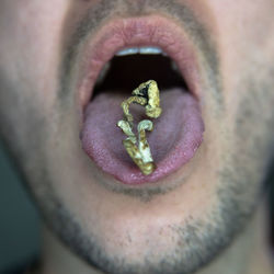 Close-up of man holding ice cream