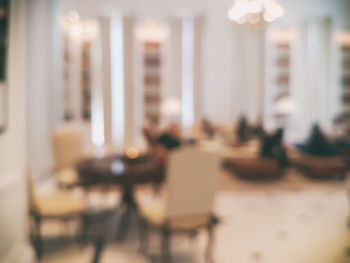 Defocused image of people at cafe