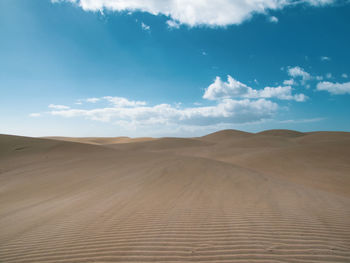 Scenic view of desert against sky