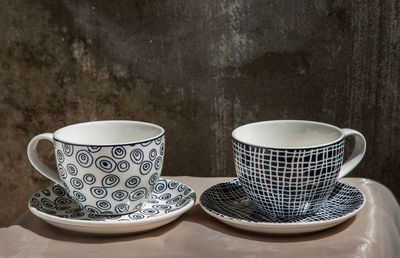 Close-up of coffee cup on table