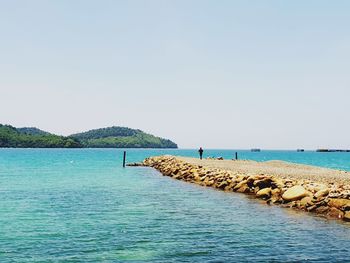 Scenic view of sea against clear sky