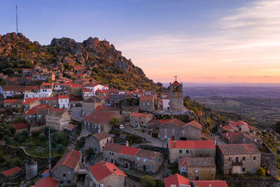 Drone aerial panorama view of monsanto historic village at sunset, in portugal