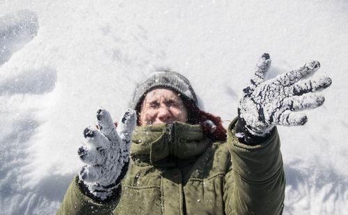 High angle view of woman in snow