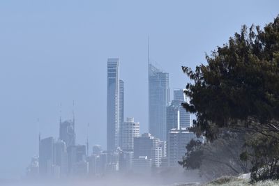 Modern buildings against clear sky