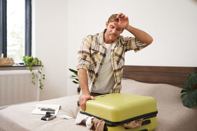 Portrait of senior man working at home