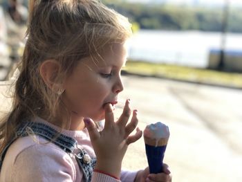 Close-up of girl eating ice cream