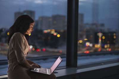 Businesswoman working late in office