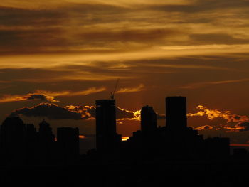 Silhouette of buildings at sunset