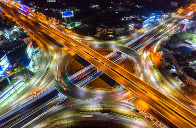 High angle view of light trails on city street