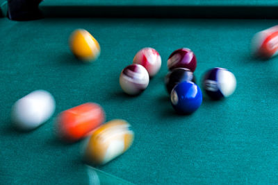 Close-up of multi colored water on table