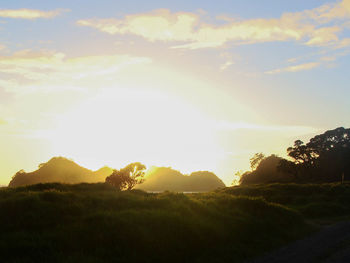 Scenic view of silhouette landscape against sky during sunset