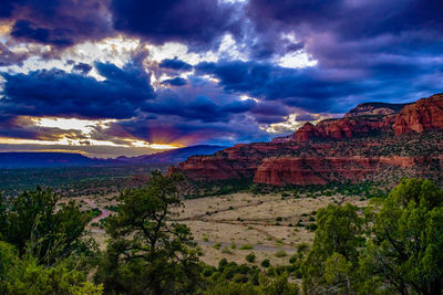 View of landscape against cloudy sky