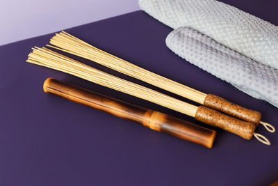 The therapeutic massage bamboo tool set of different spa equipment