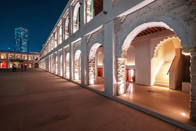 Illuminated building at night