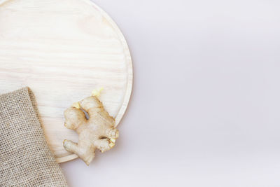 High angle view of bread on white table