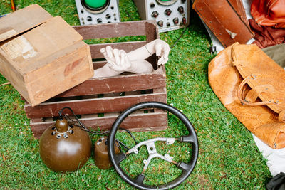 High angle view of various objects on grassy field 