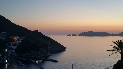 Scenic view of sea at sunset