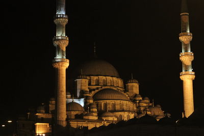 View of illuminated cathedral against sky at night