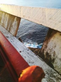 High angle view of metal railing against wall