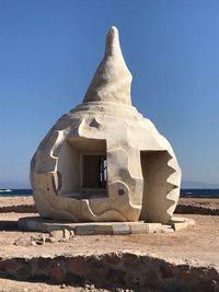 Built structure on beach against clear sky in dahab egypt