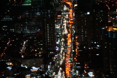 Illuminated cityscape at night