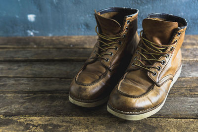 Close-up of shoes on table