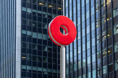 Low angle view of sign board against building