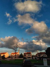 View of city against cloudy sky