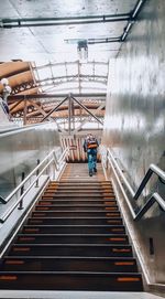 High angle view of person on staircase