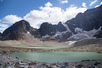 Scenic view of lake with mountains in background