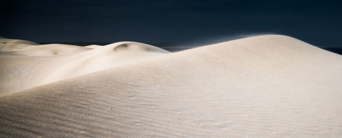 Sand dunes in a desert