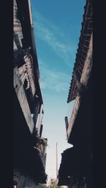 Low angle view of old building against sky