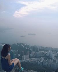 High angle view of girl and city