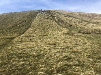 Low angle view of land against sky